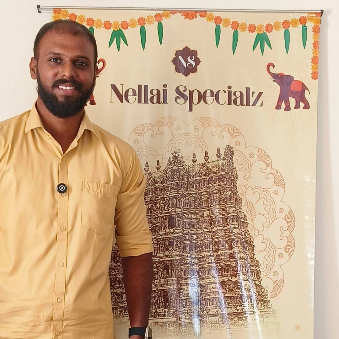 Nellai Specialz founder presenting the taste of Nellai